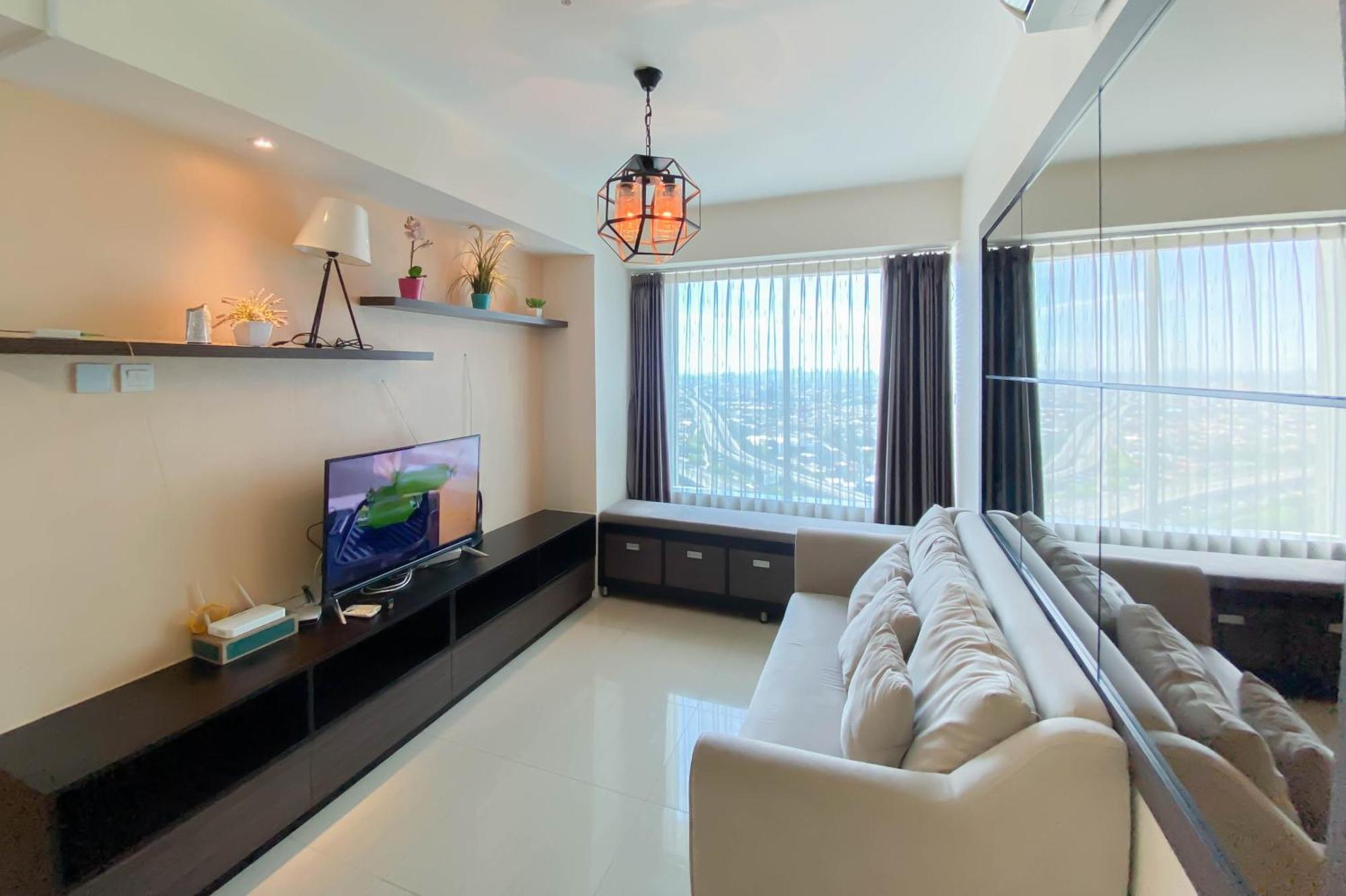 Apartemen Chic And Cozy 2br Grand Kamala Lagoon By Travelio